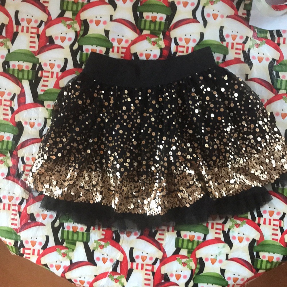 Women’s black and gold sequin mini skirt